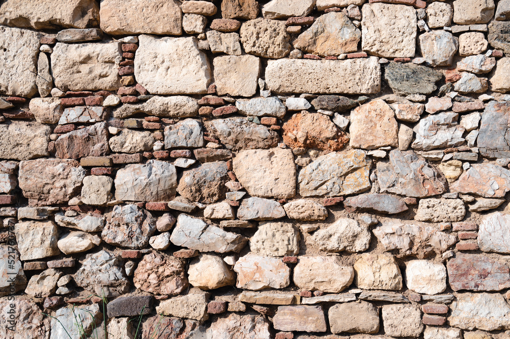 Remains of an ancient stone block wall near the sea in Greece. Remains of an ancient stone block wall near the sea in Greece.