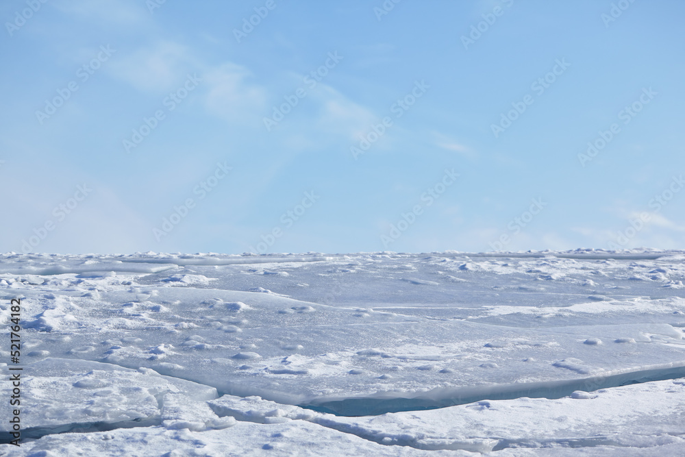 Winter ice landscape. Nanural winter background.