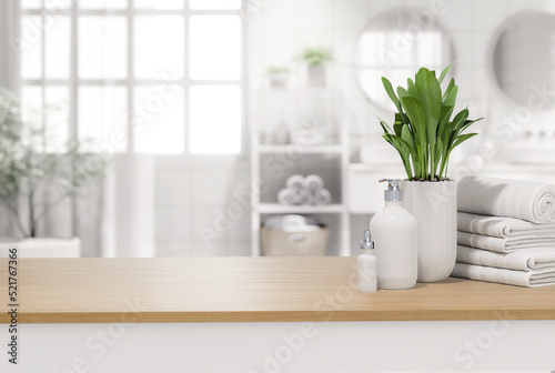 Empty wooden table table top for copy space decorate with liquid soap bottle cotton towels and plant pot with blurry bathroom background 3d render