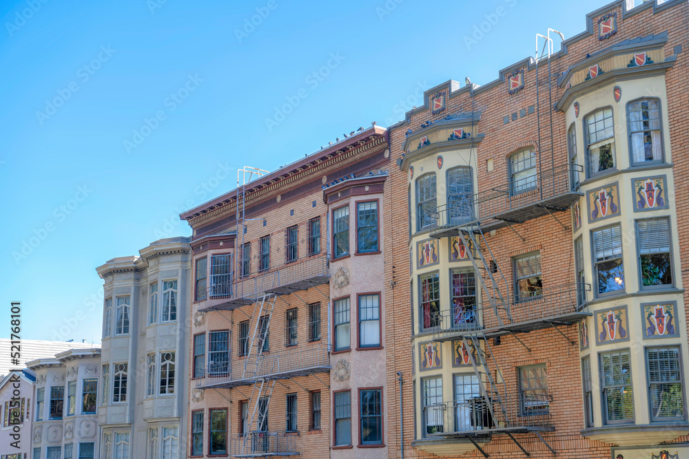 Residential building exterior with bricks and emergency stairs at San Francisco, California