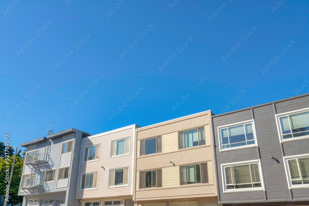 Complex box houses in San Francisco, California with picture windows