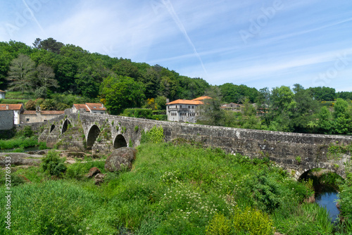 Puente románico Ponte Maceira (siglo XIII). A Coruña, Galicia, España. photo