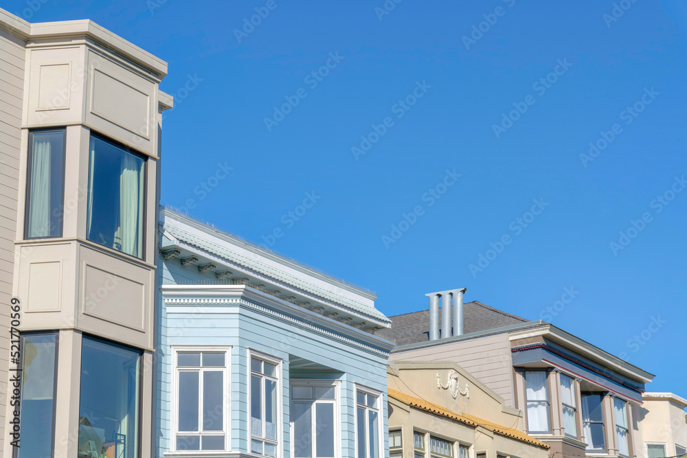 Residential buildings in a low angle view with different designs and exterior in San Francisco, CA Residential buildings in a low angle view with different designs and exterior in San Francisco, CA