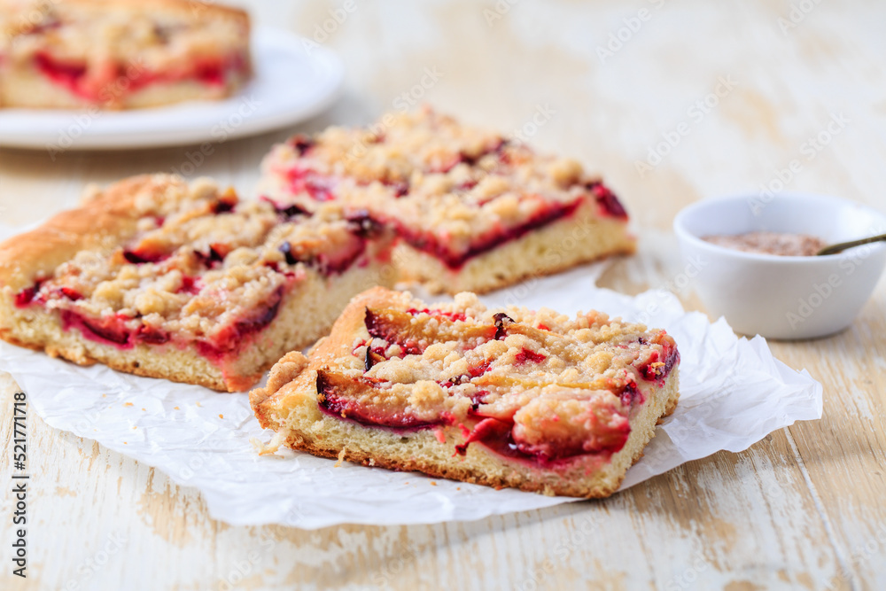 Homemade plum cake with  yeast dough and crumbles