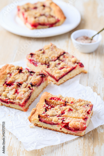 Homemade plum cake with  yeast dough and crumbles