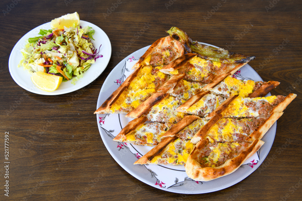 Kiymali pide. Turkish pide with minced meat. Turkish pizza mince pita Pide on white background. Etli ekmek. Kusbasi kasarli, kiymali kasarli, kiymali yumurtali, Bafra, Trabzon, Kusbasili pide. Kiymali pide. Turkish pide with minced meat. Turkish pizza mince pita Pide on white background. Etli ekmek. Kusbasi kasarli, kiymali kasarli, kiymali yumurtali, Bafra, Trabzon, Kusbasili pide.