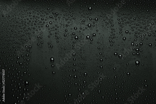 Water droplets on black background