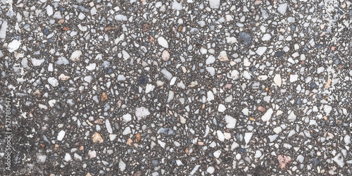 Granite texture  natural gray pattern of tiles floor for design  grainy surface of pavement. Abstract dark stones background. Old weathered urban wall. Template with blank space.