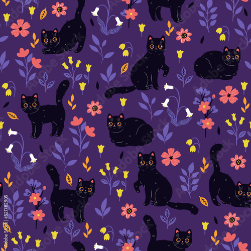 Seamless pattern with cute cats and flowers. Vector graphics.