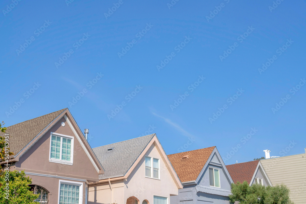 Side view of houses in a row with gable roofs at the suburbs of San Francisco, California
