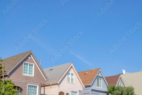 Side view of houses in a row with gable roofs at the suburbs of San Francisco, California