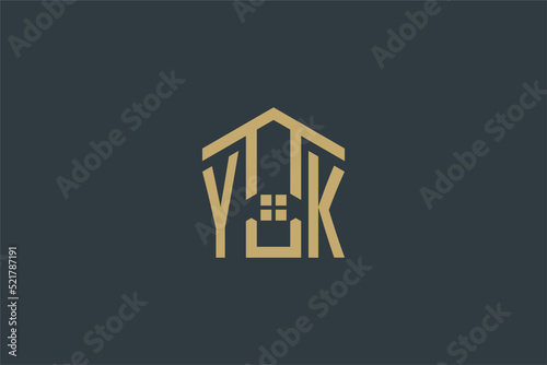 Initial YK logo with abstract house icon design, simple and elegant real estate logo design photo