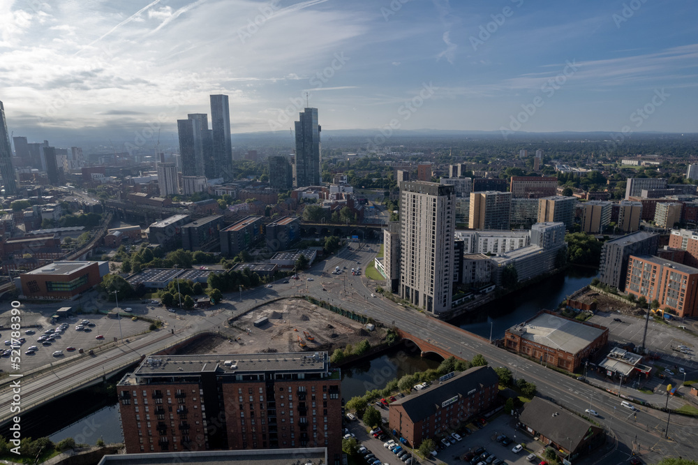 Obraz premium Manchester City Centre Drone Aerial View Above Building Work Skyline Construction Blue Sky Summer Beetham Tower Apartments Estate Agent 2022