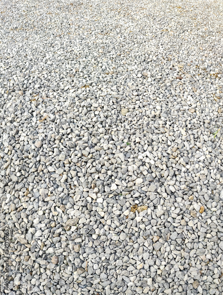 Gravel path texture. ROad made wit crushed stone. Pebble texture. Outdoor background Gravel path texture. ROad made wit crushed stone. Pebble texture. Outdoor background