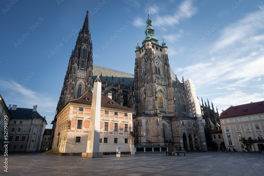 St. Vitus Cathedral at Prague Castle in Prague under moving clouds. Long exposure, Summer. No people.