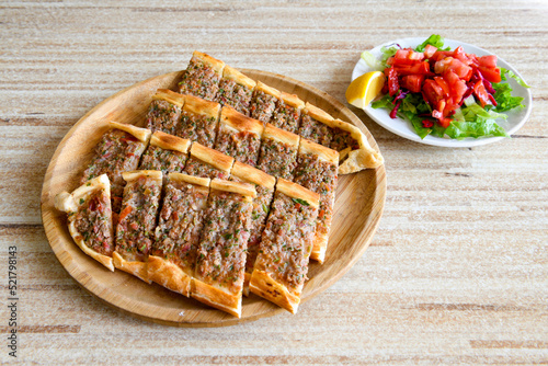 Kiymali pide. Turkish pide with minced meat. Turkish pizza mince pita Pide on white background. Etli ekmek. Kusbasi kasarli, kiymali kasarli, kiymali yumurtali, Bafra, Trabzon, Kusbasili pide.
