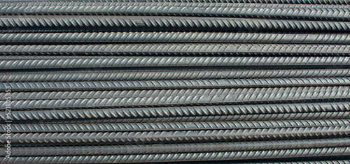 Close-up stacked wire steel rebar material, rebar for industrial and construction work, texture and background