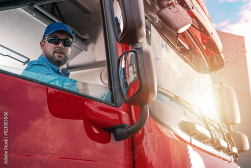 Canvas Print Truck Driver Looking Through the Cab Window