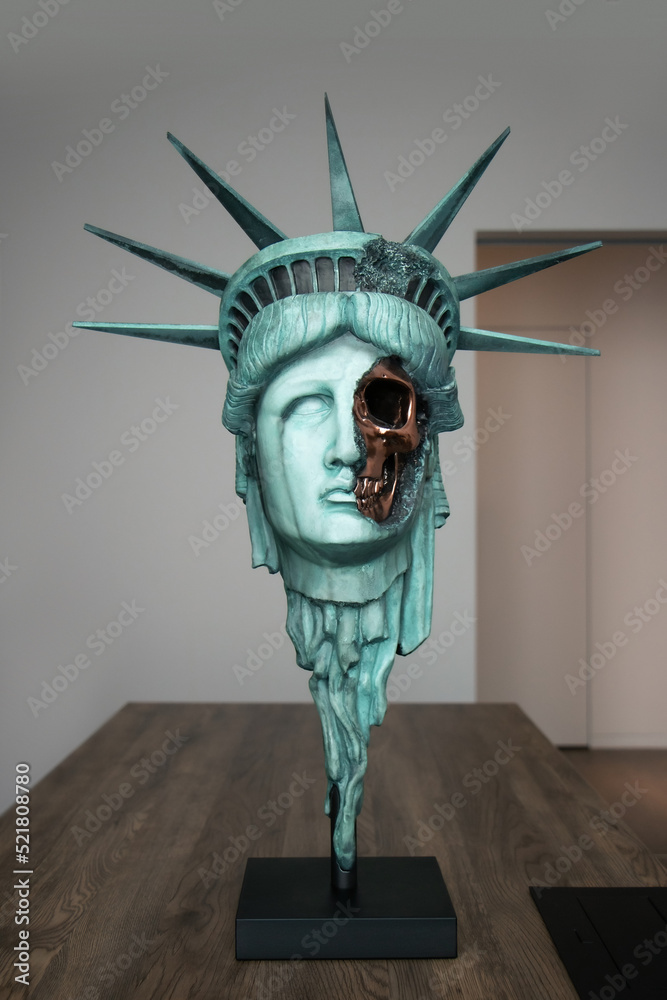 The head of the Statue of Liberty, part of the skull is visible Stock