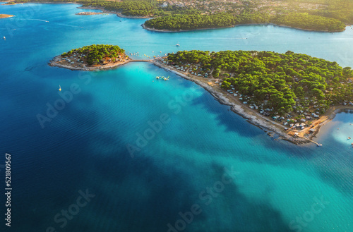 Wallpaper Mural Camping, vacation concept. Beautiful Medulin aerial view. Top view from drone of coastline at sunset to a tent city on a peninsula, colorful seascape, Croatia Torontodigital.ca