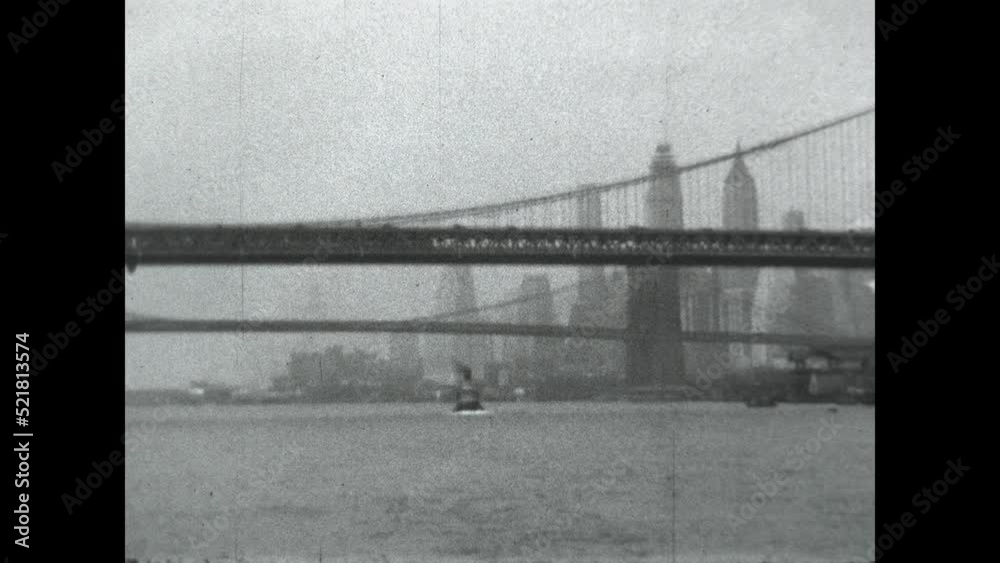 East River Bridges 1931 - Viewing the Brooklyn, Manhattan and Williamsburg Bridges from a ferry traveling on the East River in New York City, 1931.