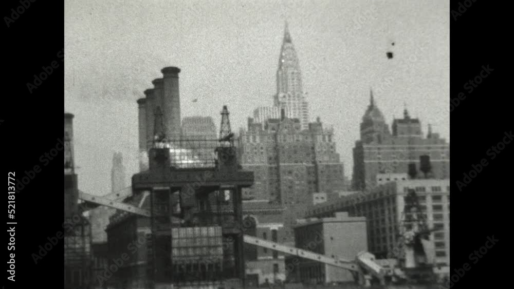 East River Views 1931 - The Chrysler Building and the Empire State Building are among New York City structures viewed from a ferry traveling on the East River, in 1931. 