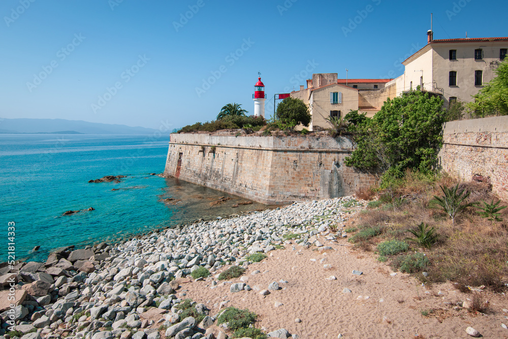 Ajaccio citadel with lighthouse from the pier at the harbor, Corsica Island.