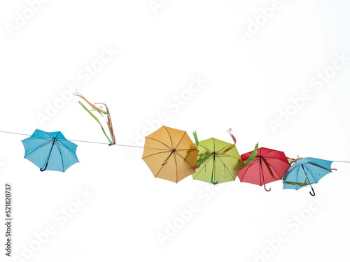 colorful umbrellas isolated on white. © wlad074