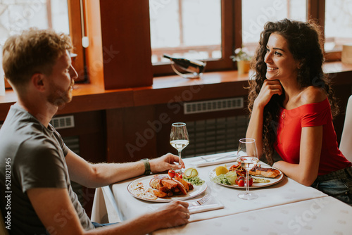 Young couple having lunch w...