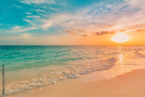 Sea ocean beach sunset sunrise landscape outdoor. Water wave with white foam. Beautiful sunset colorful sky with clouds. Natural island, sun rays seascape, dream nature. Inspirational shore, coast