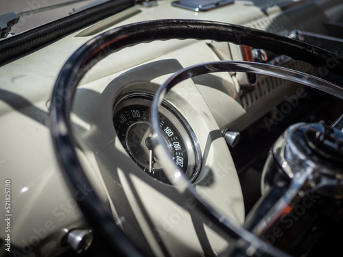 Dashboard and steering wheel of old-timer car