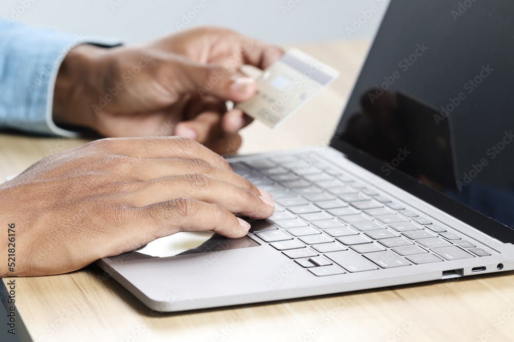 Businessmen shop online using credit cards to pay online. Businessmen shop online using credit cards to pay online.