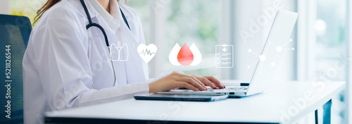 Doctor using digital tablet with medical infographic on virtual hologram display at hospital, Tele-medical health care service concept