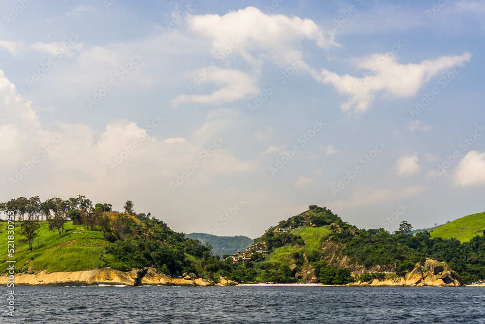 View from the sea of the coast and it vegetation of Niteroi City, State of Rio de Janeiro, Brazil.