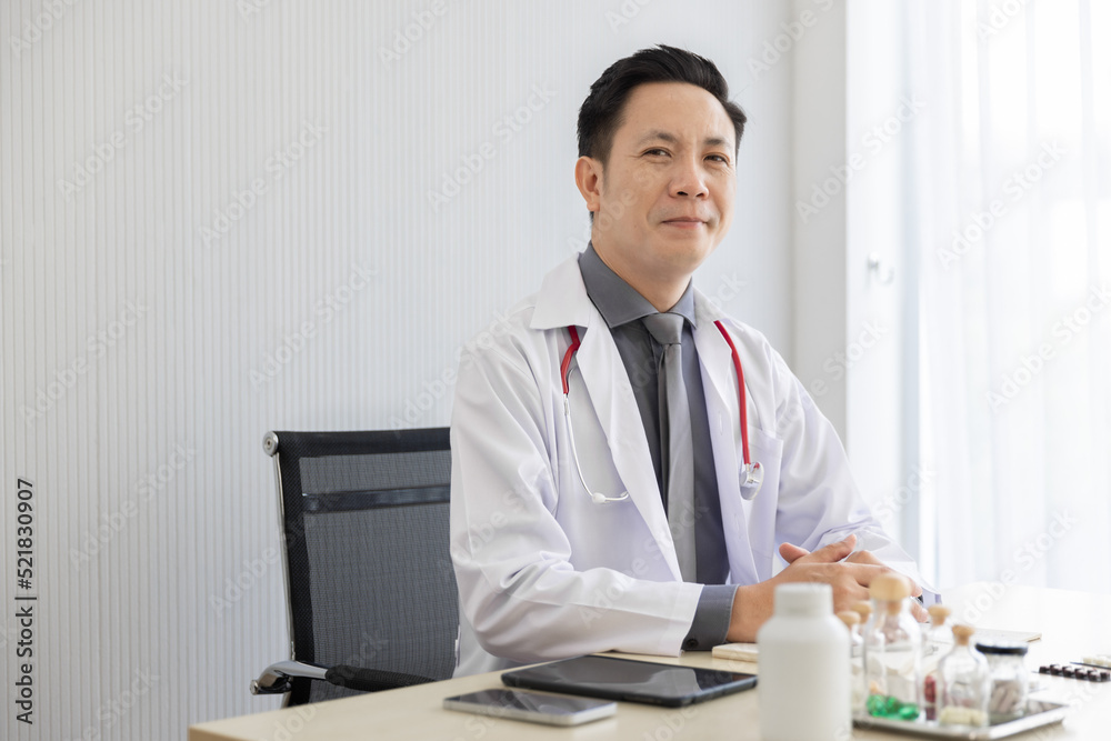 Portrait of asian mid-adult male doctor healthcare professionals at hospital Portrait of asian mid-adult male doctor healthcare professionals at hospital