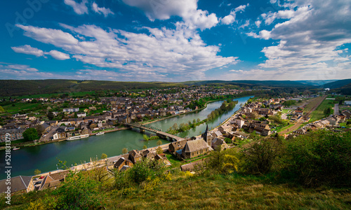 View over a small town in the valley of the river Meuse in France