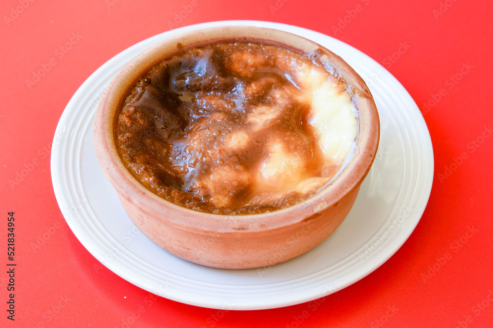Baked rice pudding turkish milky dessert sutlac, keskul (Turkish name; firin sutlac) Baked rice pudding turkish milky dessert sutlac, keskul (Turkish name; firin sutlac)