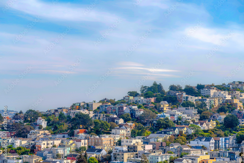 Rows of residential buildings with trees outdoors in San Francisco, California