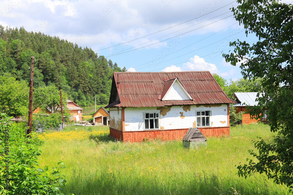 Wooden house in sunny day in Yaremche, Ukraine