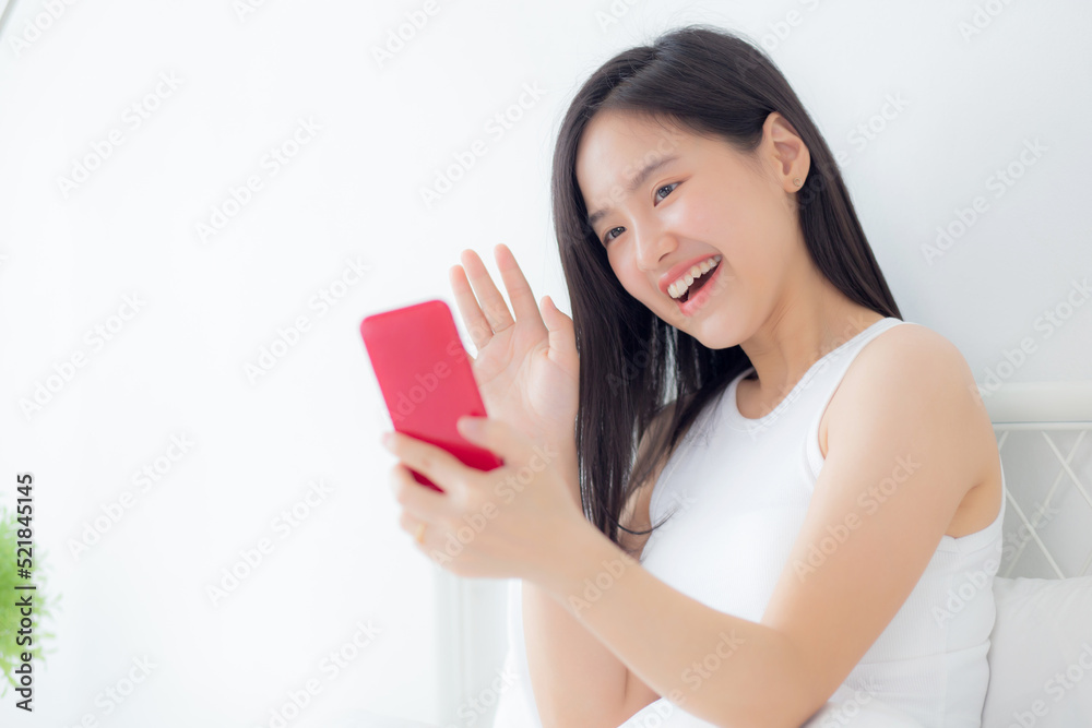 Young asian woman using smartphone for video conference online with friends, businesswoman working with video call for meeting with social network with smart phone, business and communication concept. Young asian woman using smartphone for video conference online with friends, businesswoman working with video call for meeting with social network with smart phone, business and communication concept.