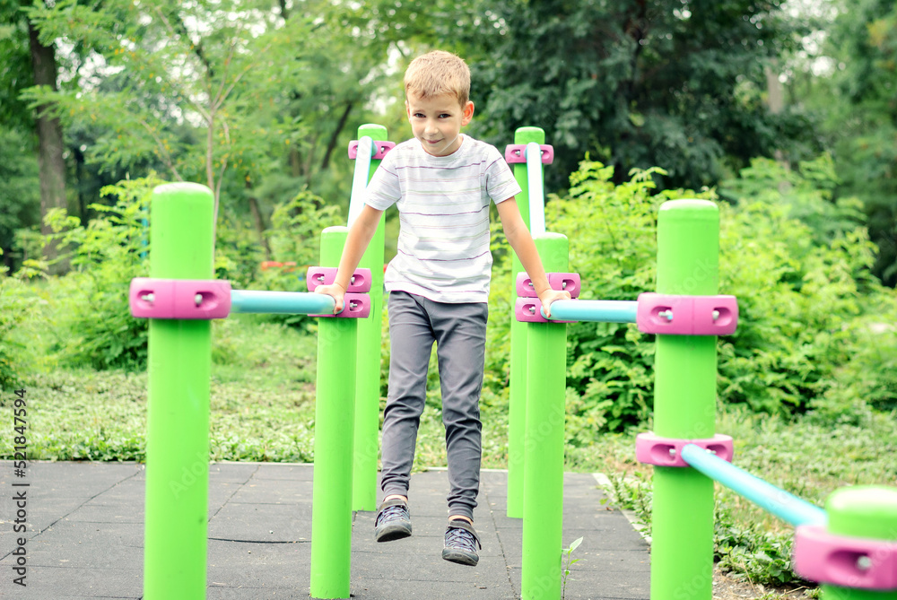 Fototapeta premium little boy on the playground
