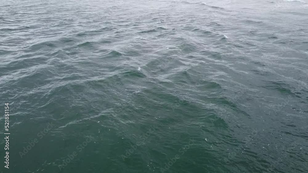 The surface of the sea, top view. Full frame video of the water surface.