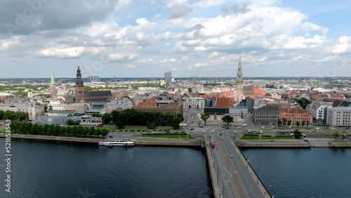 Wallpaper Mural A bridge over river Daugava right in the center of the city leading to the National Library. Bridges in Latvia. Aerial Riga view. Torontodigital.ca