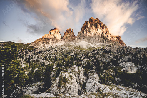 Sun rise at Sassolungo in the Dolomites photo