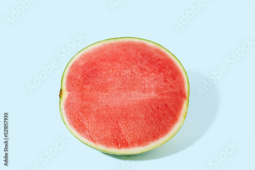 Cut watermelons on blue background