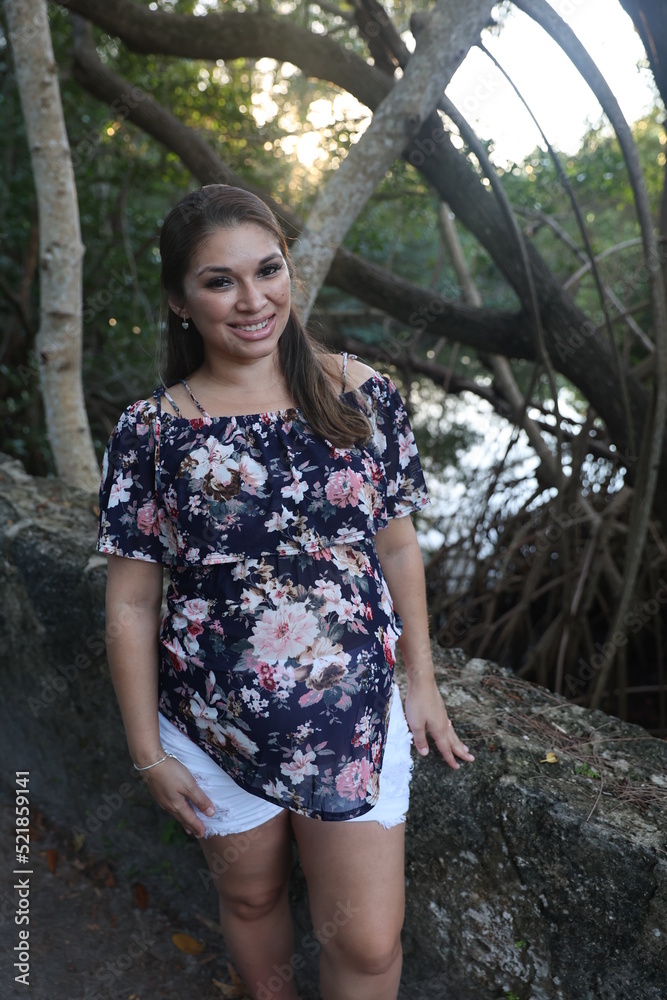 Miami, Florida / United States – December 31, 2021: Maternity Photoshoot in a Park Miami, Florida / United States – December 31, 2021: Maternity Photoshoot in a Park