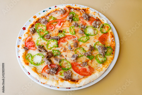 Delicious mixed pizza with rich content. Menu concept of choice and diversity. Karisik pizza