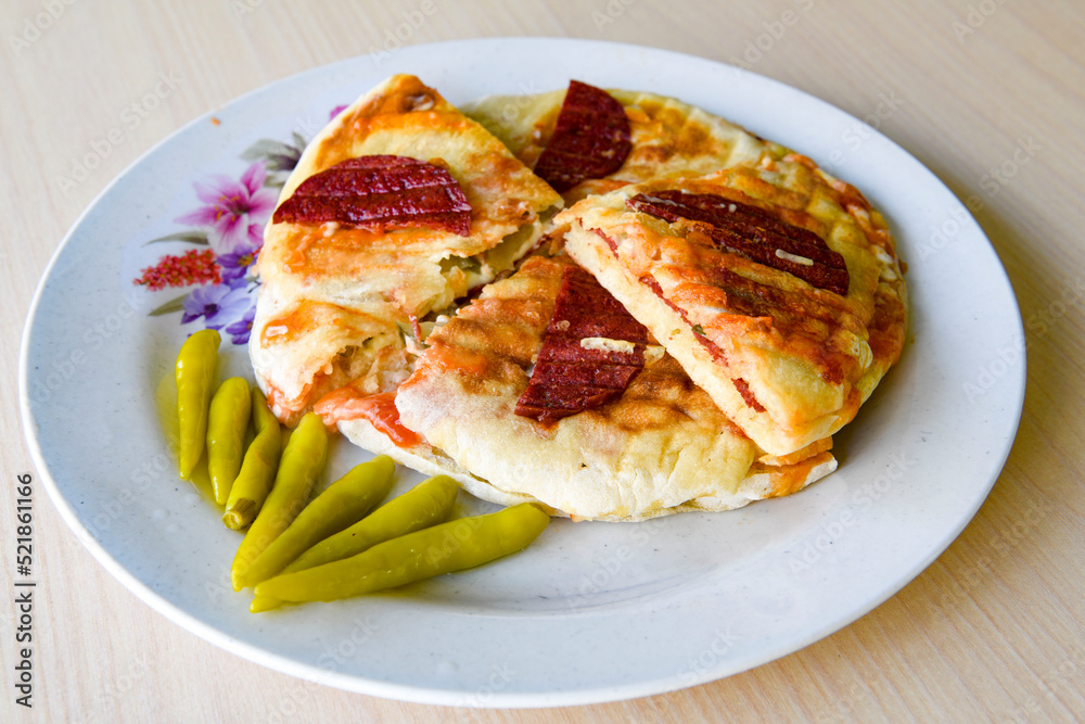 Turkish karisik atom  tost ( kasarli bazlama tost) . Flat baked bread toasted