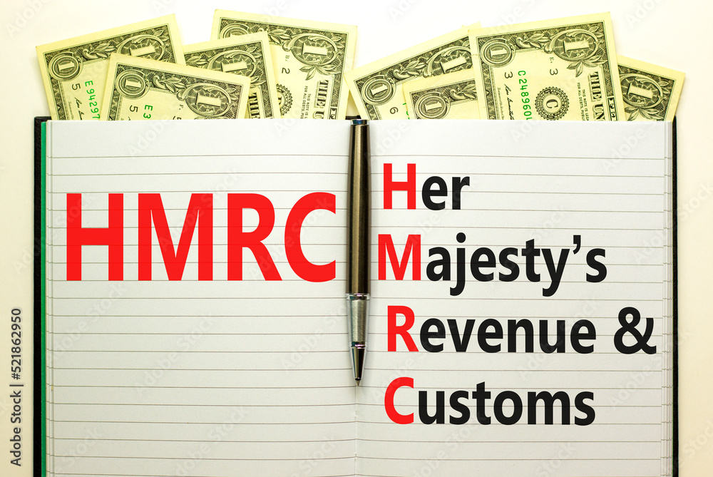 HMRC her majestys revenue and customs symbol. Concept words HMRC her majestys revenue and customs on white note on beautiful dollar background. Business HMRC revenue and customs concept. Copy space.