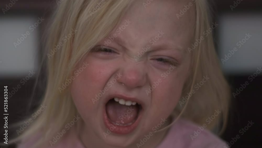 Portrait little blonde girl starting cry and scream. Children sad emotions. Close up. Portrait little blonde girl starting cry and scream. Children sad emotions. Close up.